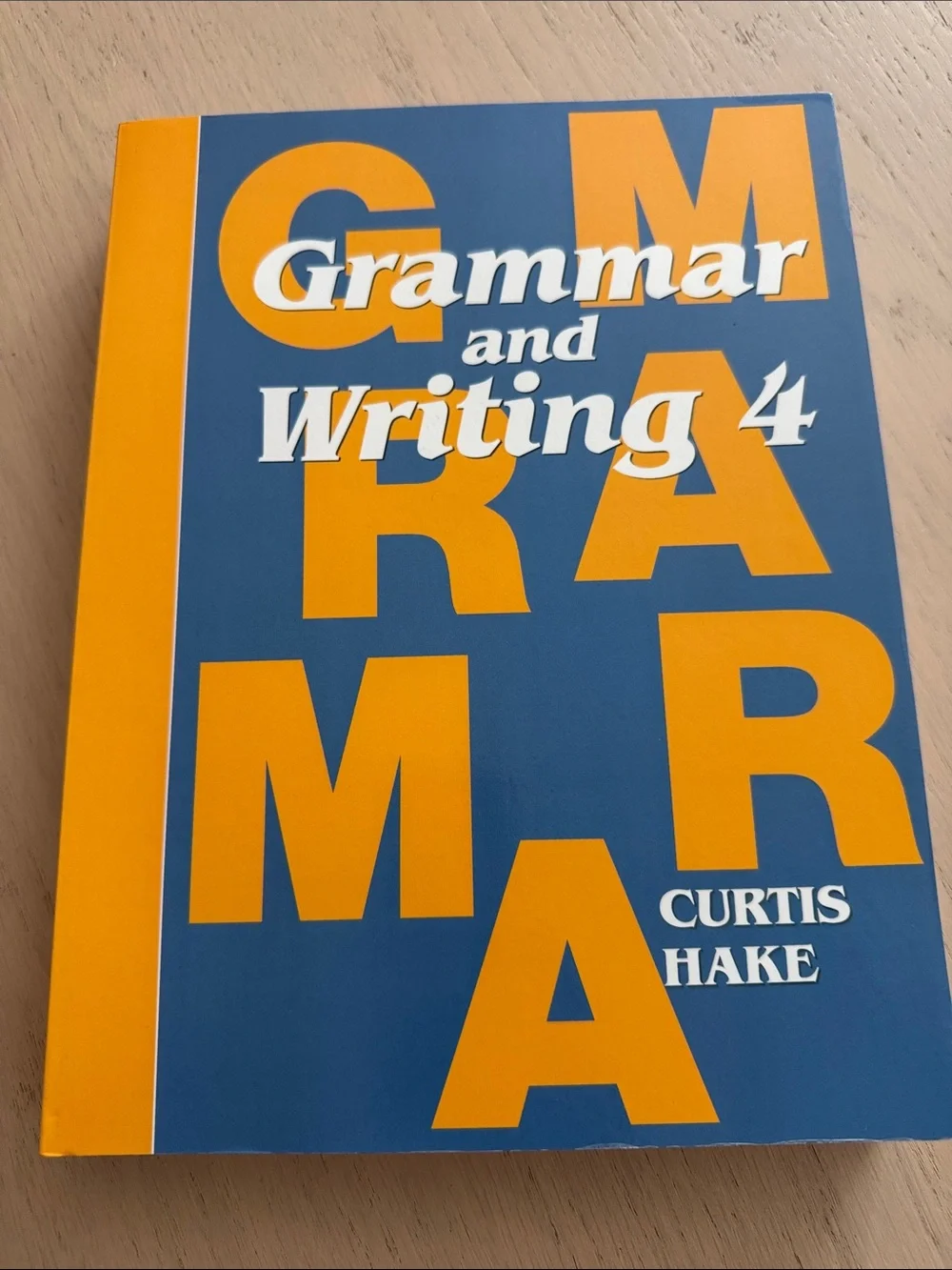 Grammar and Writing 4 Student Workbook by — Blue & Orange